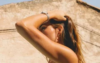 woman in white bikini bottom